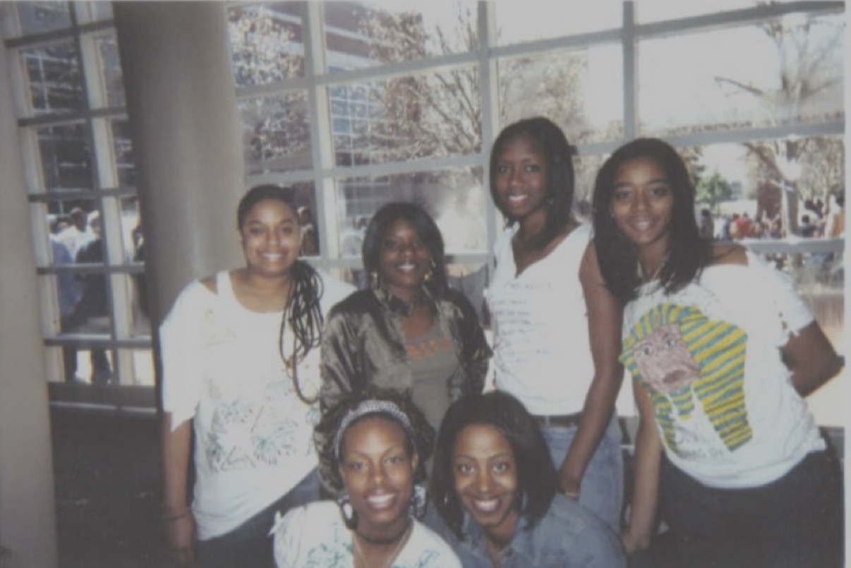 A group of TSU friends photographed in the student center in the mid-2000s.